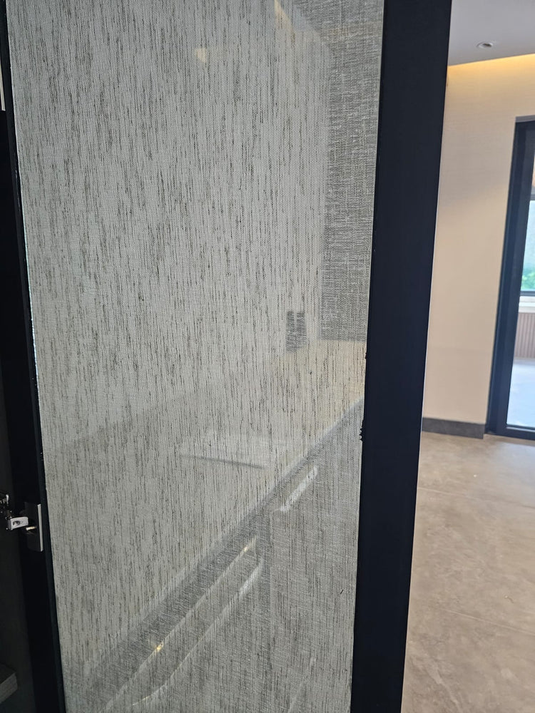 Fabric-Laminated Glass